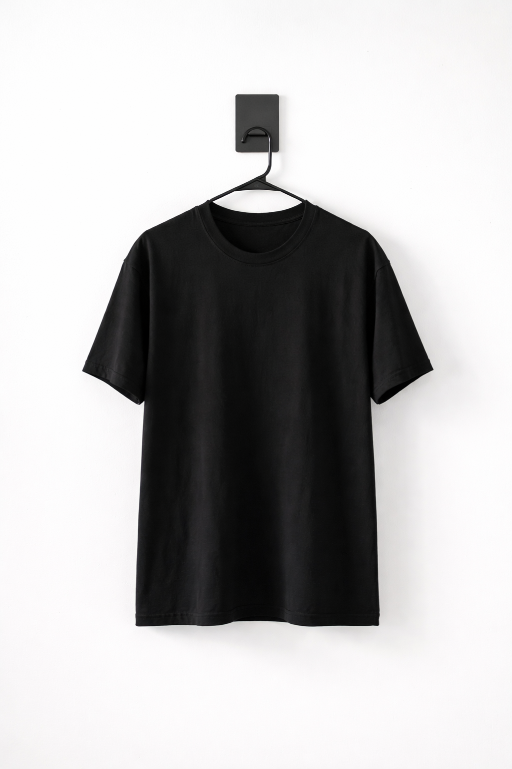 GIDE Mount holding a black shirt